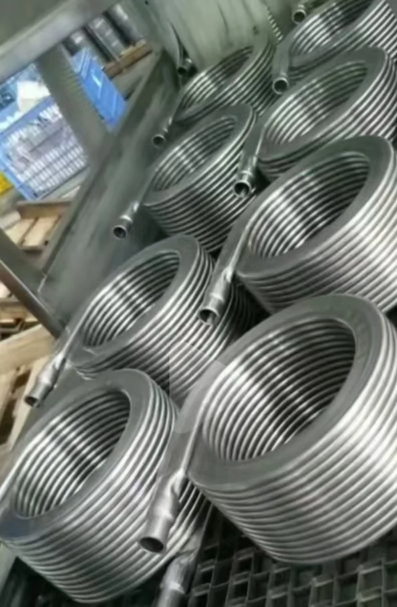 Several formed tube coils with projecting ends arranged on a workshop rack