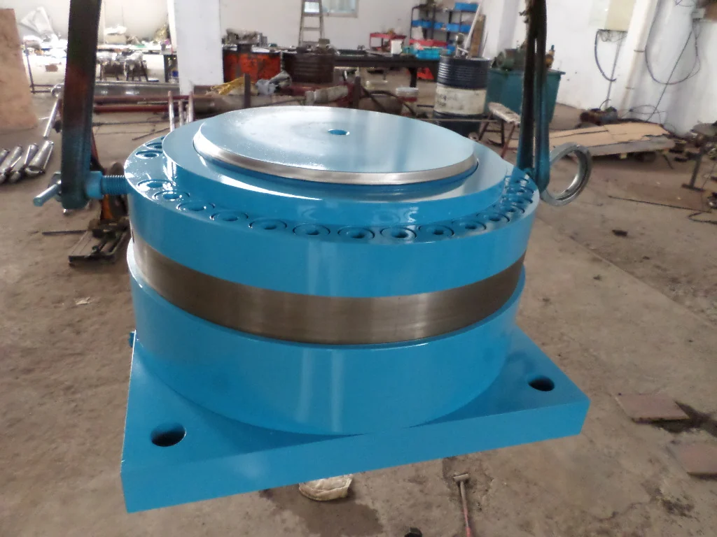 Blue industrial hydraulic cylinder with a square base and circular bolted head